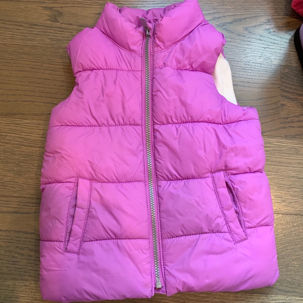 purple puffer vest. new without tags. so cute!